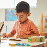 young play colouring in
