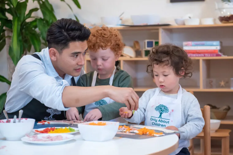 Tommy Pham making savoury lollipops with children at Only About Children campus
